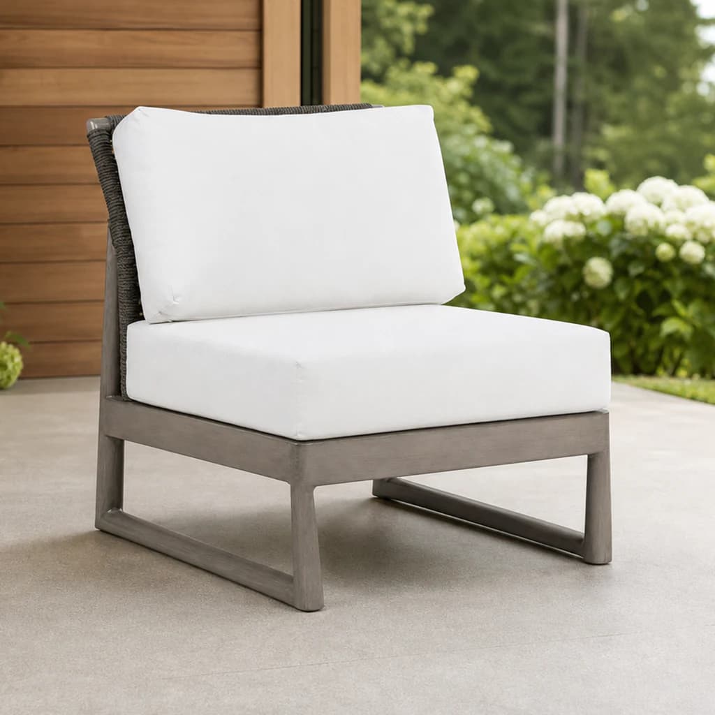 Ratana FN58753-C Park West armless sectional chair module on a Pacific Northwest patio.