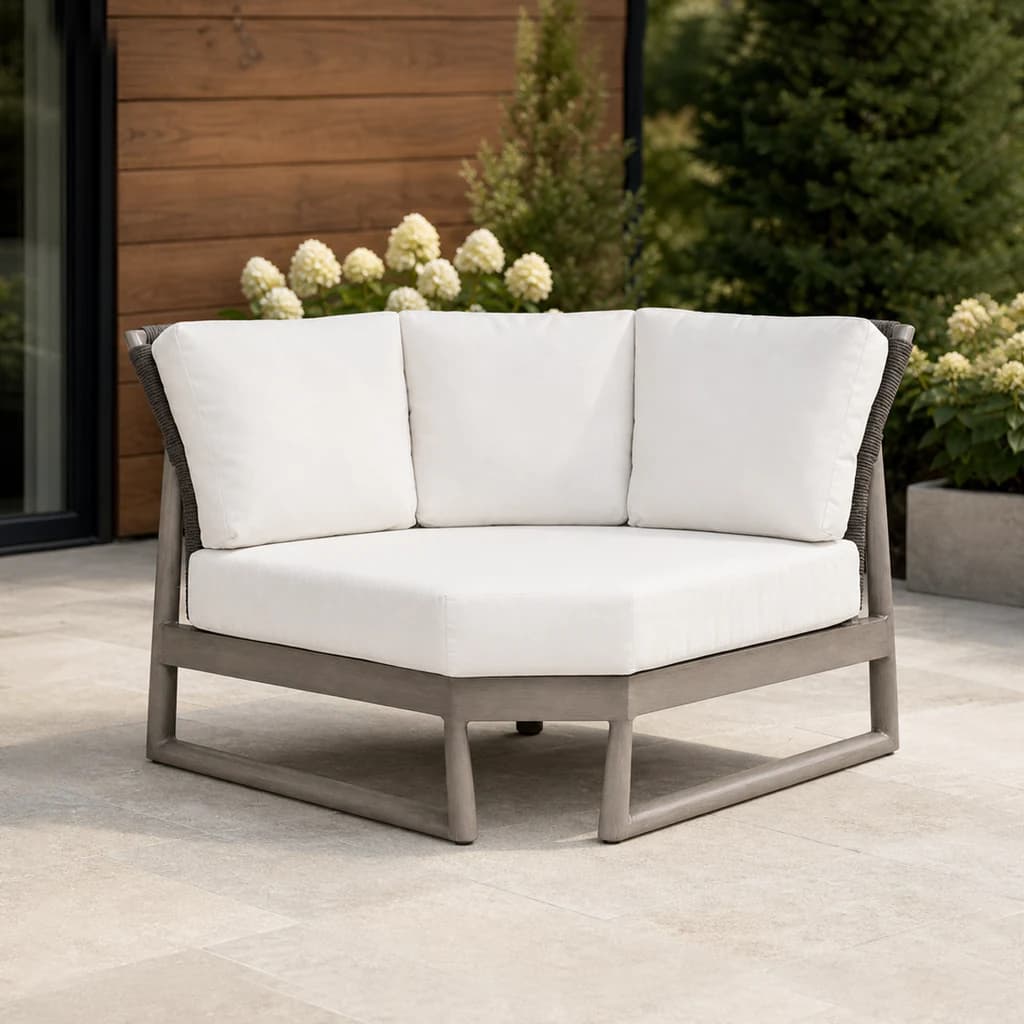 Ratana FN58753-V Park West curved corner sectional module on a Pacific Northwest patio.
