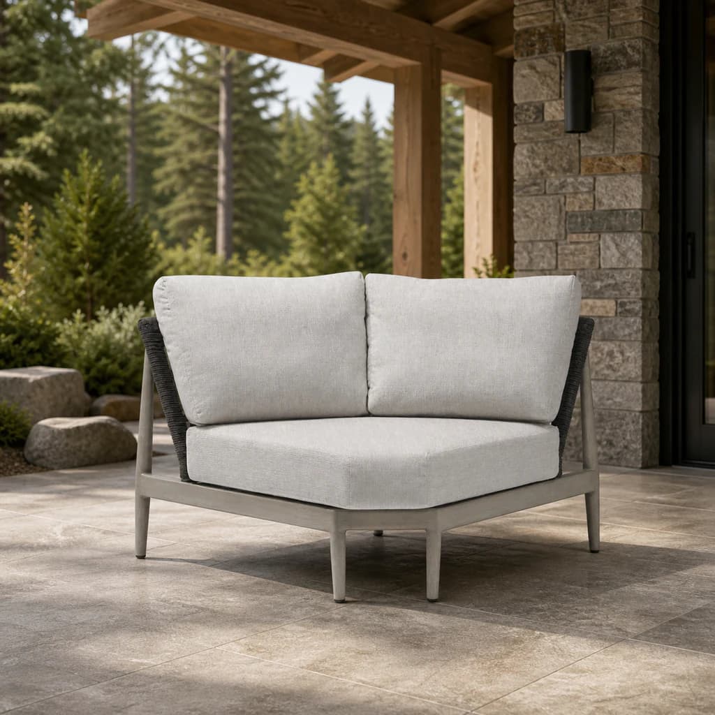 Ratana FN60153-V Coconut Grove curved corner module on a covered evergreen patio.