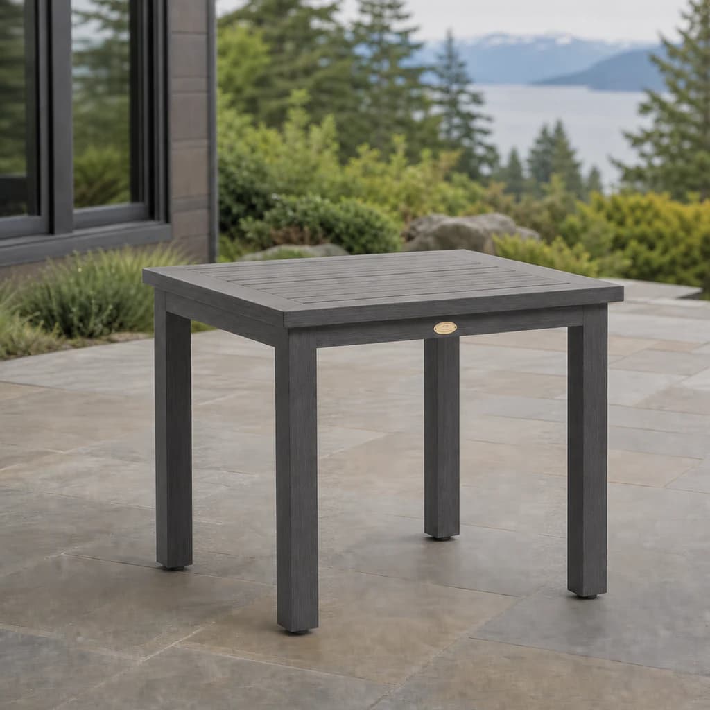 Ratana FN61105 Canbria square slatted end table on a lake-view stone terrace.
