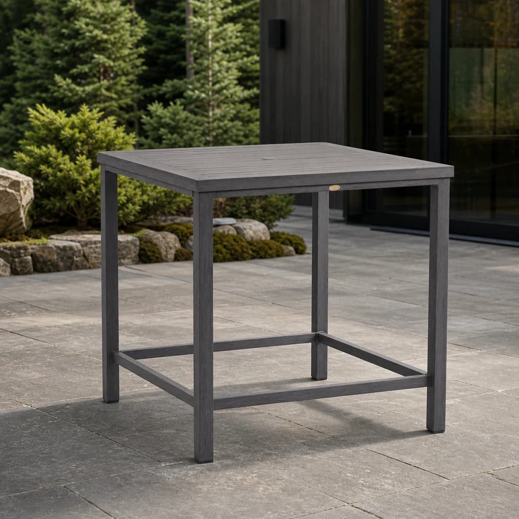 Ratana FN61142 Canbria 39-inch square counter table with umbrella hole on a modern stone terrace.