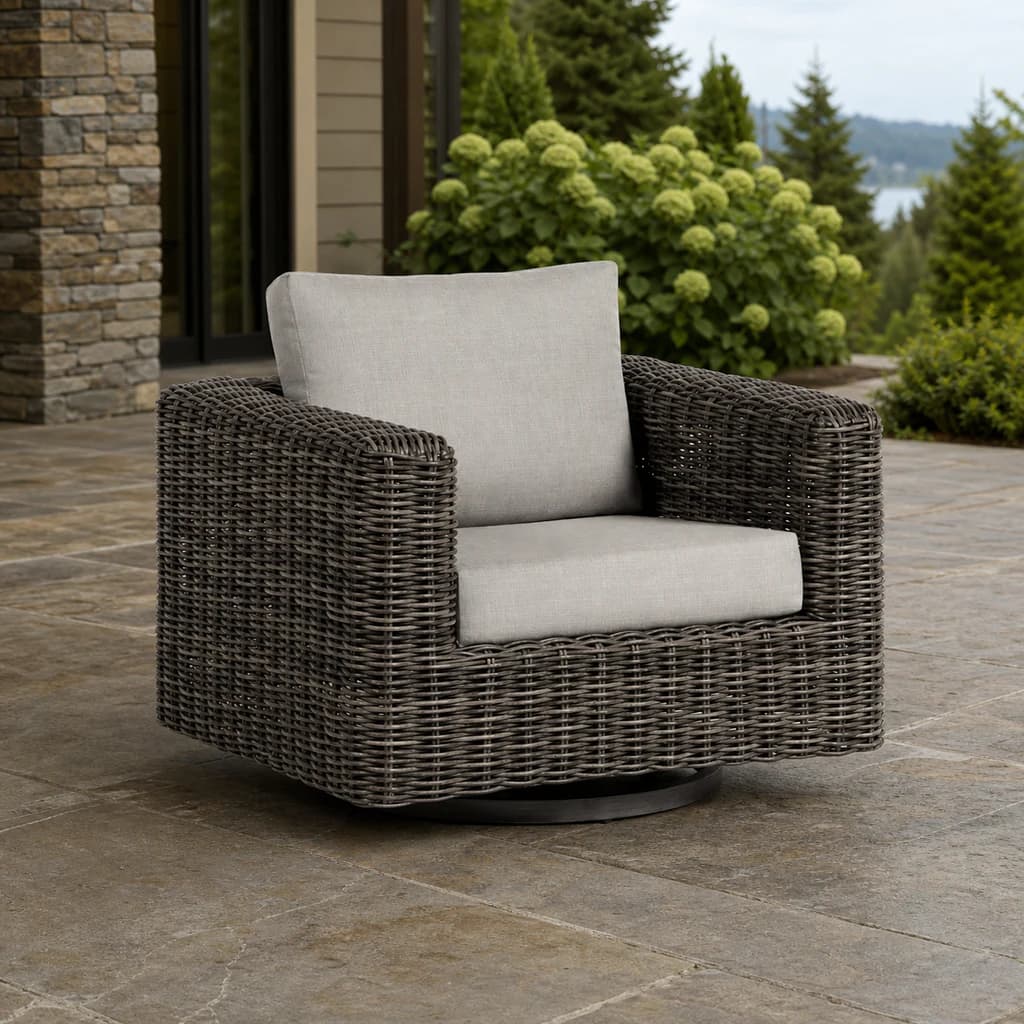 Ratana FN61290 Cubo swivel gliding club chair on a hydrangea patio.
