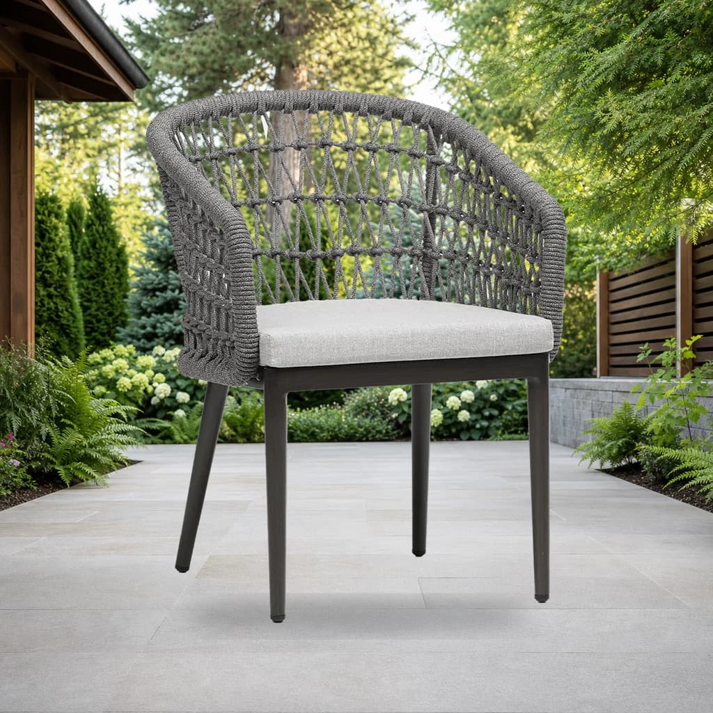 Ratana FN61312 Poinciana dining arm chair on a Pacific Northwest garden patio.