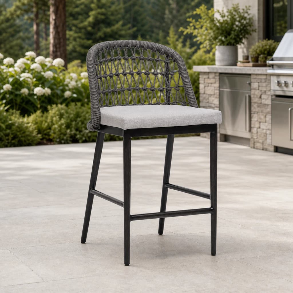 Ratana FN61340 Poinciana counter chair on a Pacific Northwest outdoor-kitchen patio.
