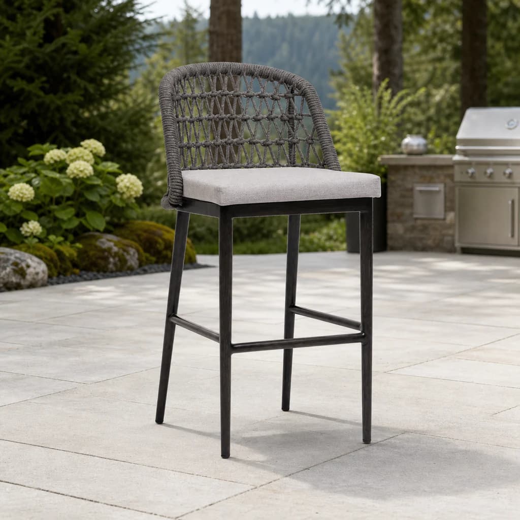 Ratana FN61341 Poinciana bar chair on a Pacific Northwest outdoor-kitchen patio.