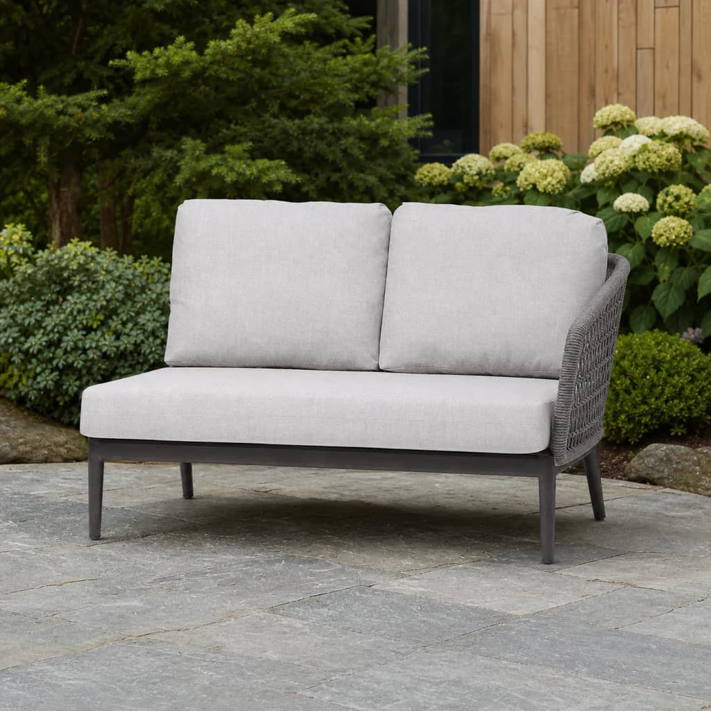 Ratana FN61352-R Poinciana right-arm sectional module on a Pacific Northwest patio.