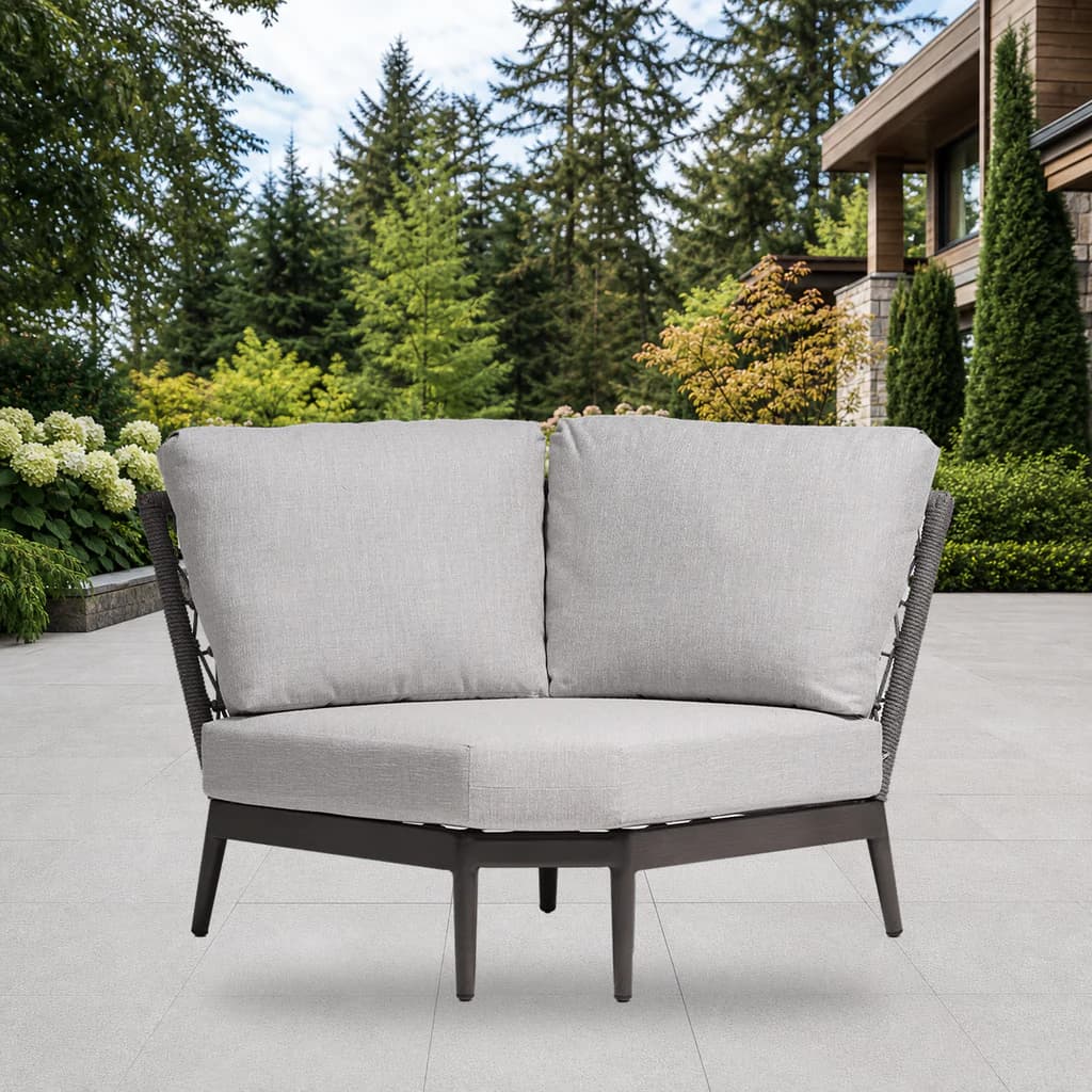Ratana FN61353-V Poinciana curved-corner sectional module on a Pacific Northwest patio.