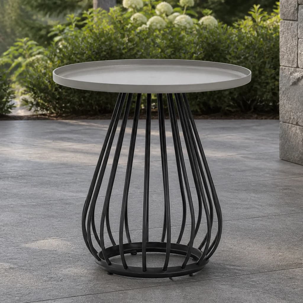 Ratana FN61605 Diva round end table on an evergreen stone patio.
