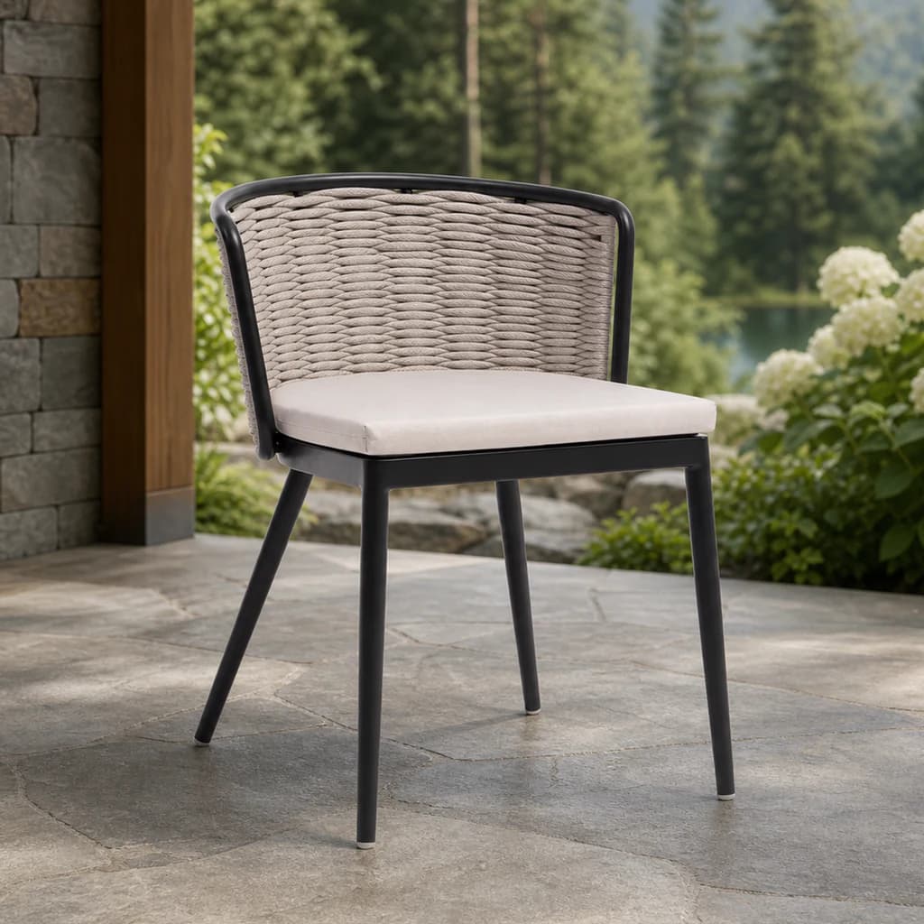 Ratana FN61611 Diva armless dining side chair on a stone patio.