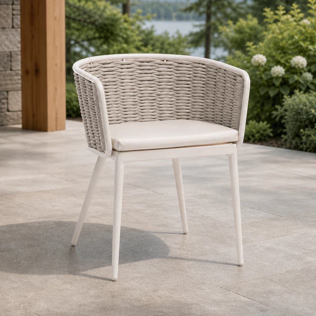 Ratana FN61612 Diva dining arm chair on a covered garden patio.