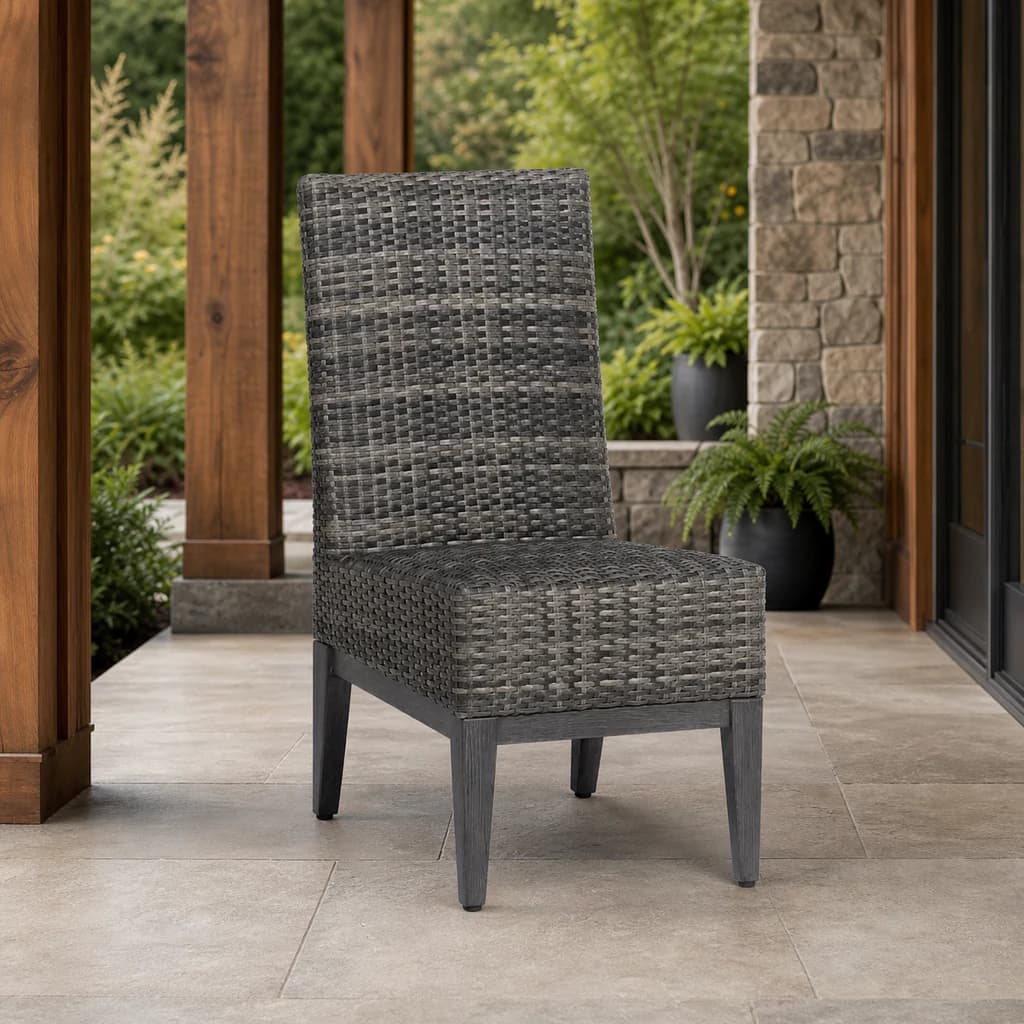 Ratana FN61711 Biltmore armless Dining Side Chair in charcoal weave on a covered patio.