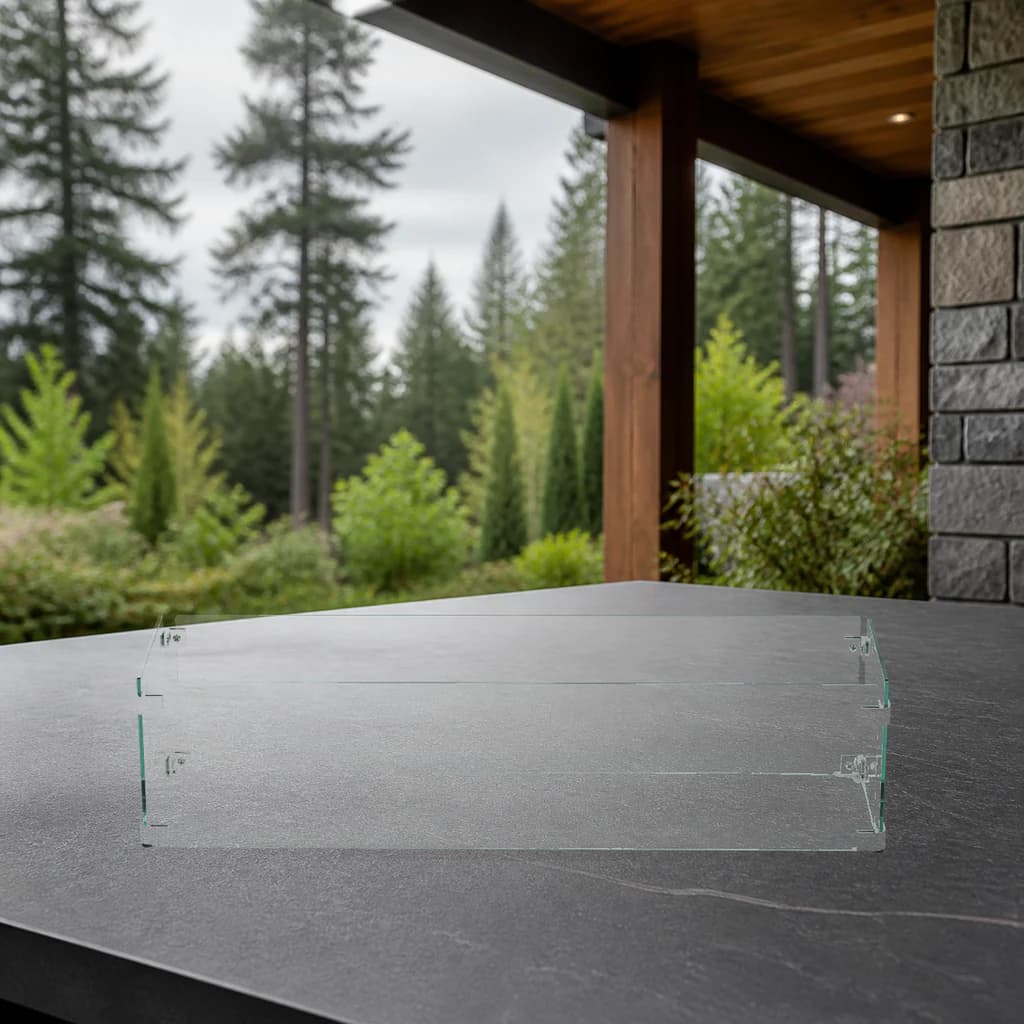 Ratana FN62600WIN-TN-TN-TN-TN-T long rectangular fire-pit glass windshield on a premium outdoor stone surface.