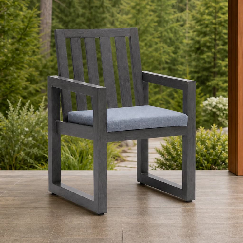 Ratana FN64312 Milano dining arm chair on a covered evergreen terrace.