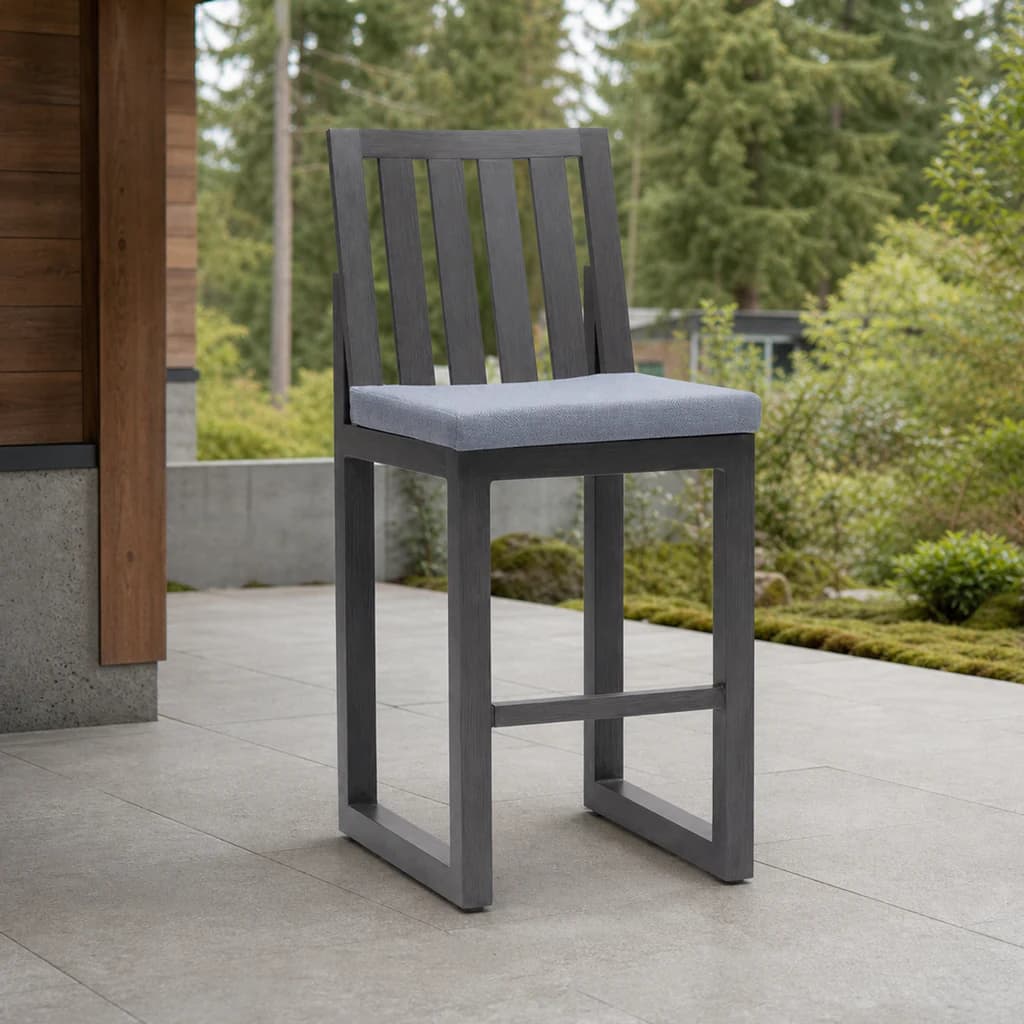Ratana FN64341 Milano armless bar chair on a covered evergreen patio.