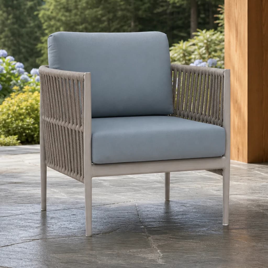 Ratana FN64701 Lineas club chair on a hydrangea garden terrace.