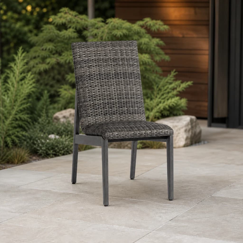 Ratana FN64911 Cabo San Lucas armless Dining Side Chair on an evergreen patio.