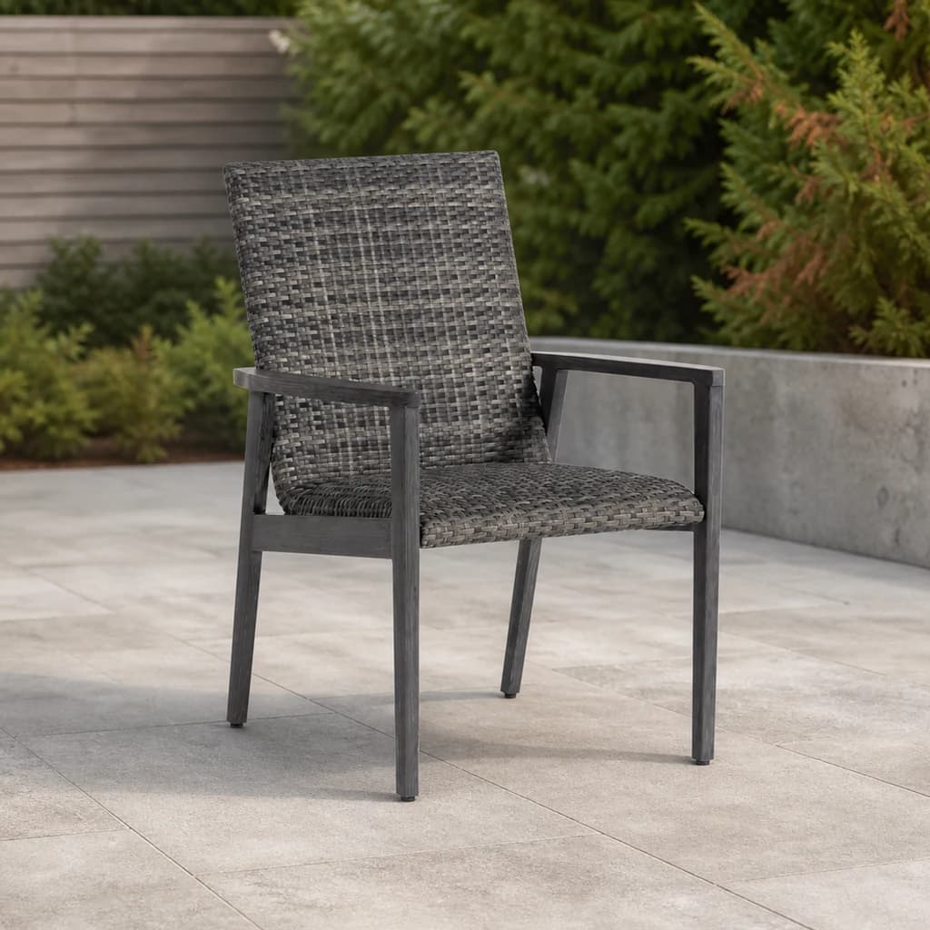 Ratana FN64912 Cabo San Lucas Dining Arm Chair in charcoal weave on a stone patio.