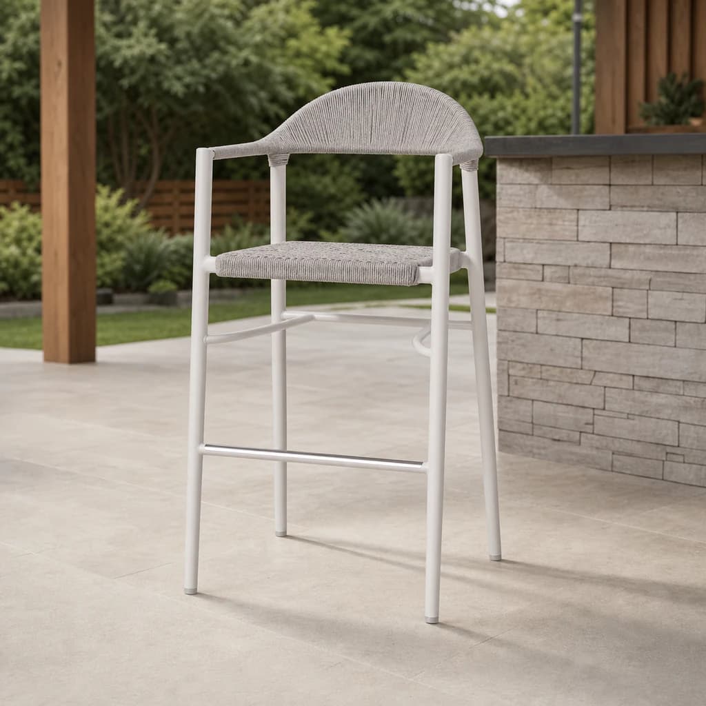 Ratana FN67444 Ballina pale woven bar chair with arms on a Pacific Northwest outdoor kitchen patio.