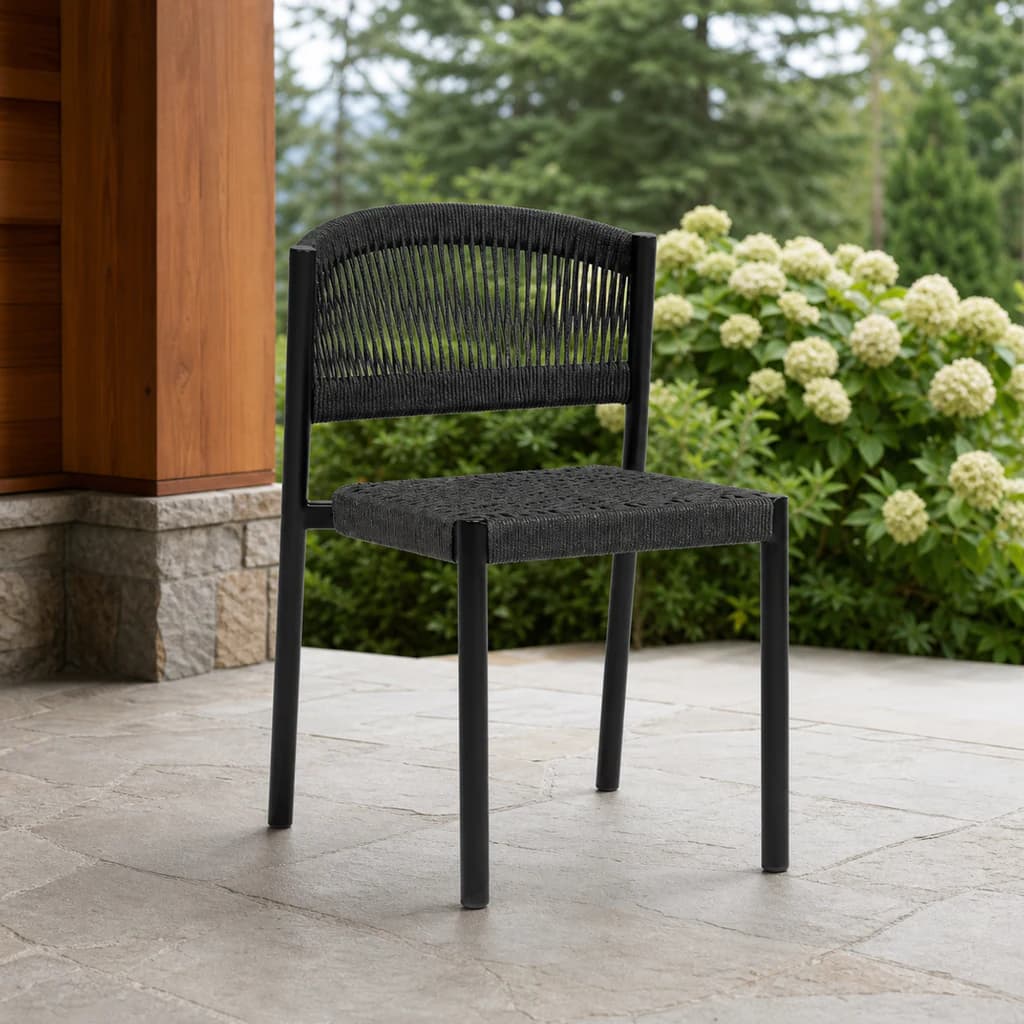 Ratana FN67511 Naples armless dining side chair on a covered garden patio.