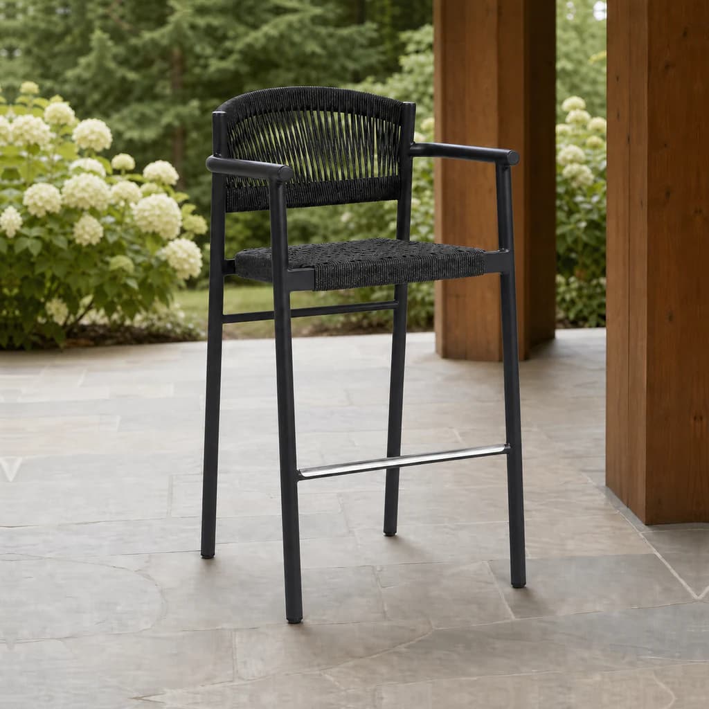 Ratana FN67544 Naples bar chair with arms on a covered garden terrace.
