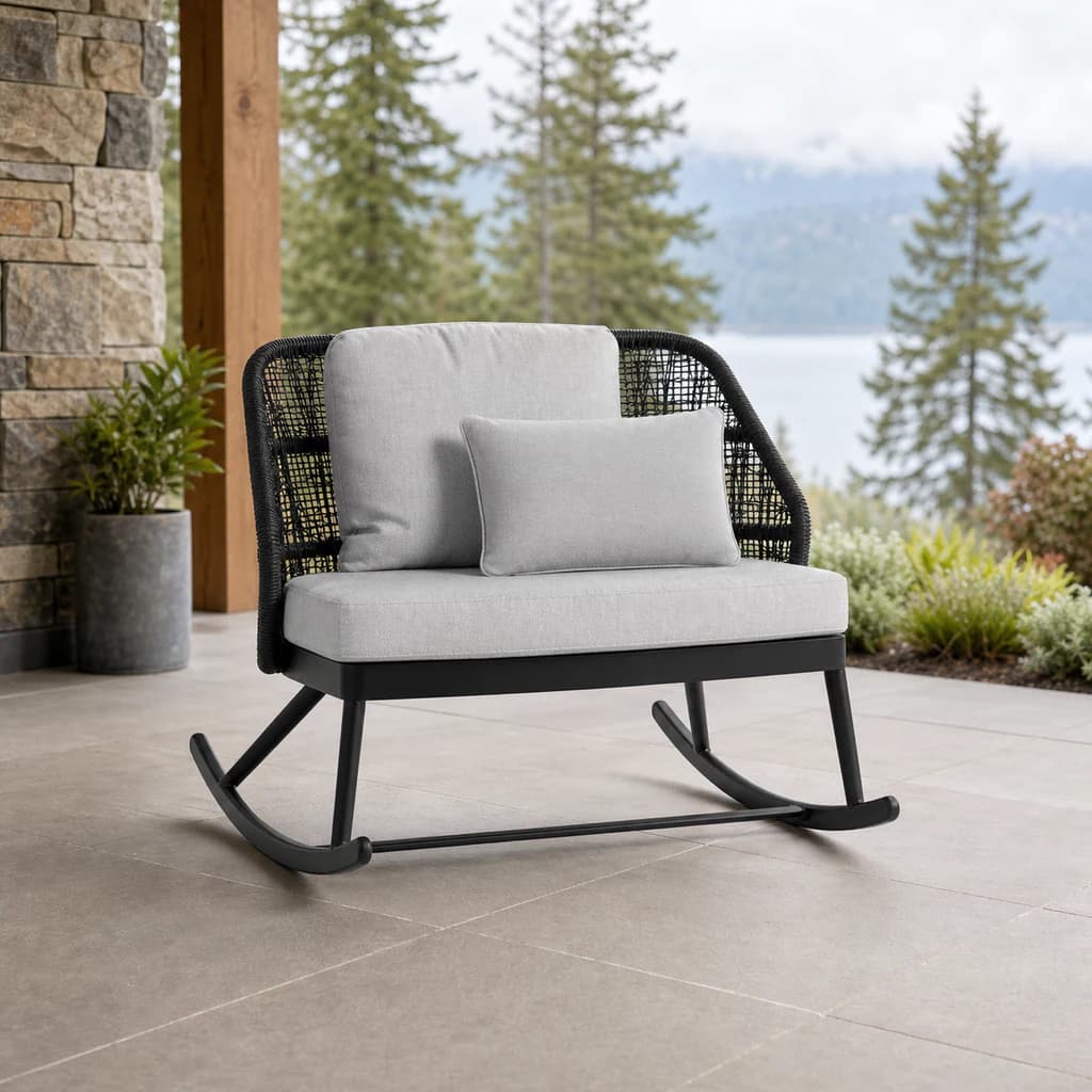 Ratana FN68279 rocker chair with plain cushions and toss pillow on a premium covered patio.