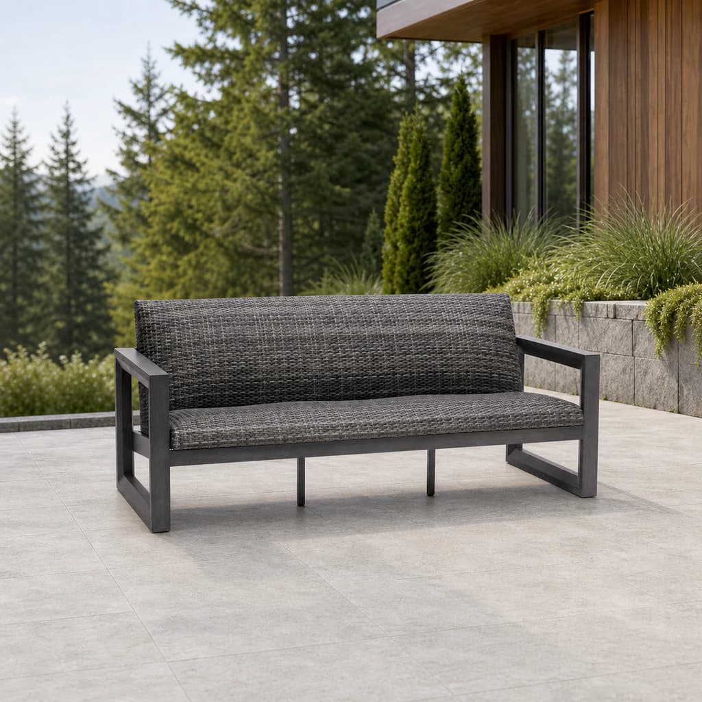 Ratana FN68403 Bergen Sofa with charcoal aluminum frame and continuous gray woven seat and back on a mountain terrace.