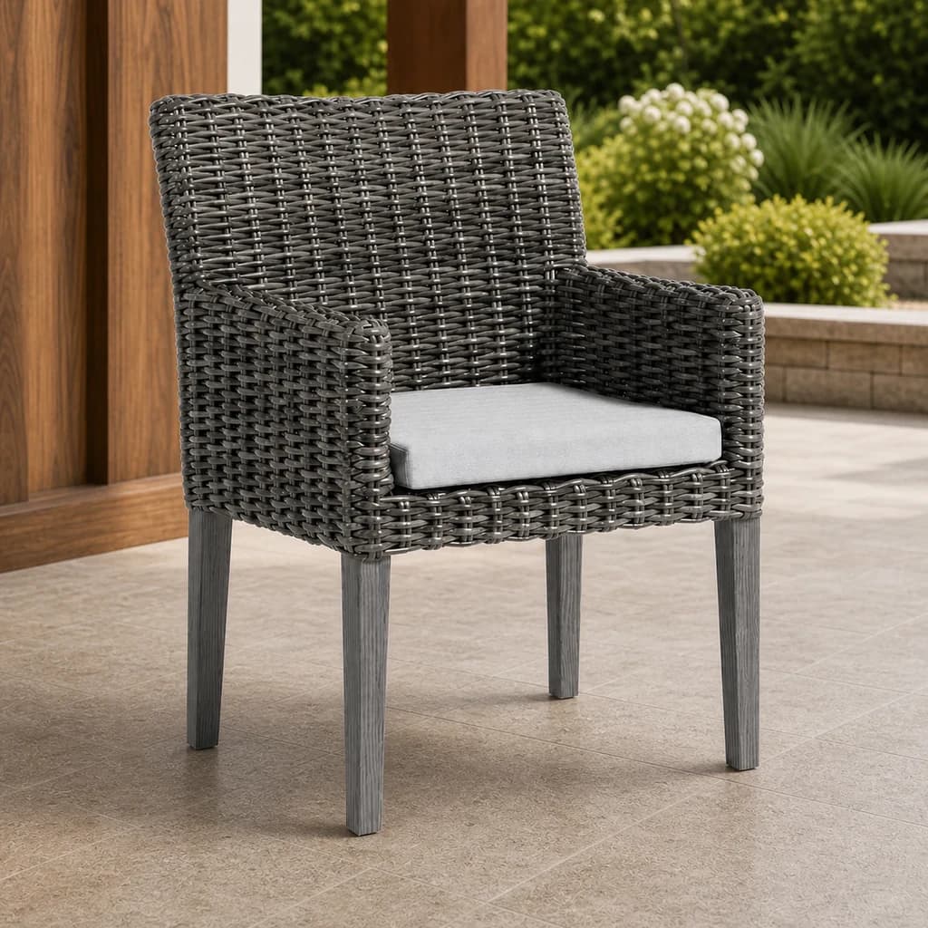 Ratana FN69312 Dining Arm Chair on a sunlit stone patio.