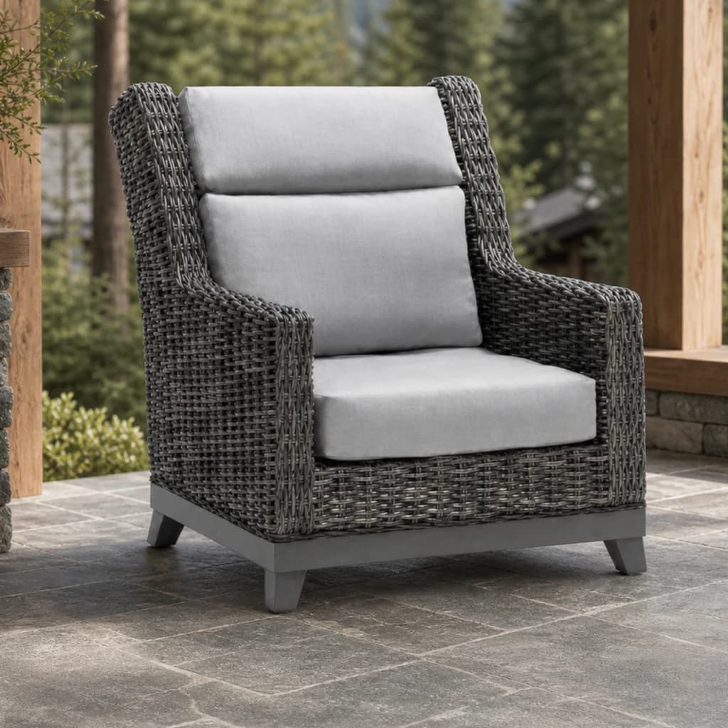 Ratana FN69385 Budapest Highback Wing Chair with split pale back cushions on an evergreen patio.