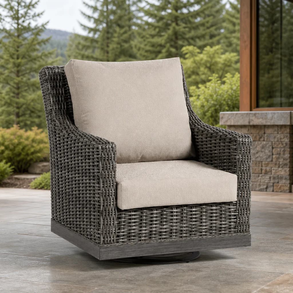Ratana FN69390 Budapest Swivel Gliding Club Chair with charcoal woven body and circular base on a covered patio.