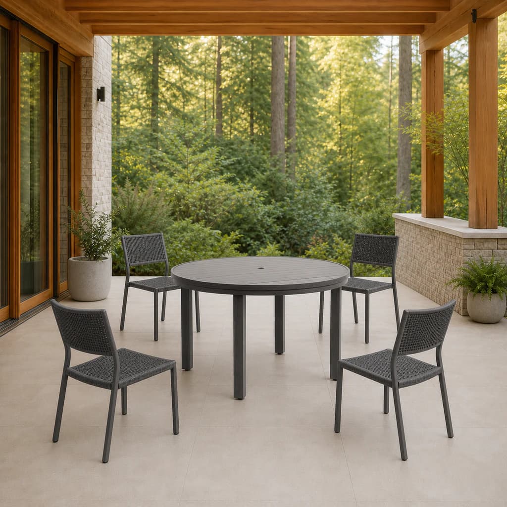 Ratana FN69415 Sunbury 54-inch round dining table with umbrella hole on a covered patio.