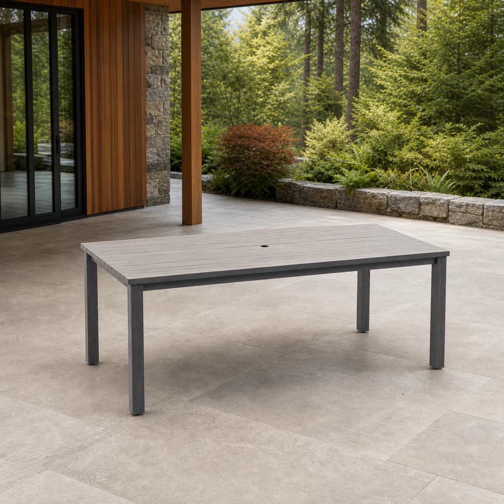 Ratana FN69463 Sunbury 84-inch rectangular Dining Table with centered umbrella hole on a covered patio.