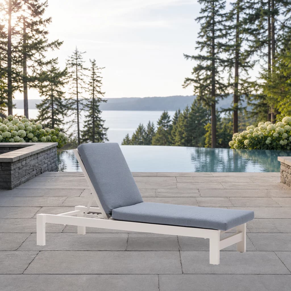 Ratana Vienna adjustable white aluminum lounger with exact raised-back mechanism and blue-gray cushions by a Pacific Northwest pool.