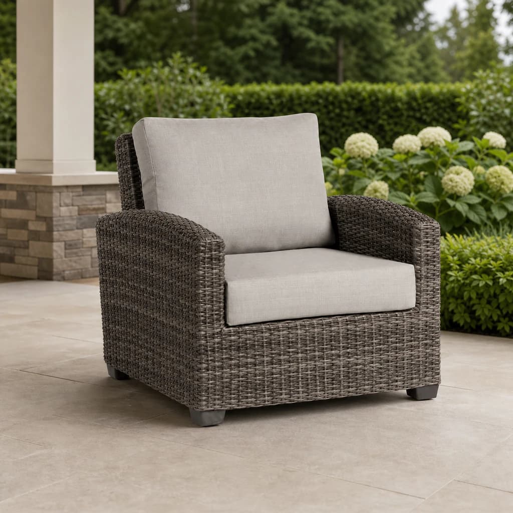 Ratana FN71201 Coral Gables club chair on a covered evergreen patio.