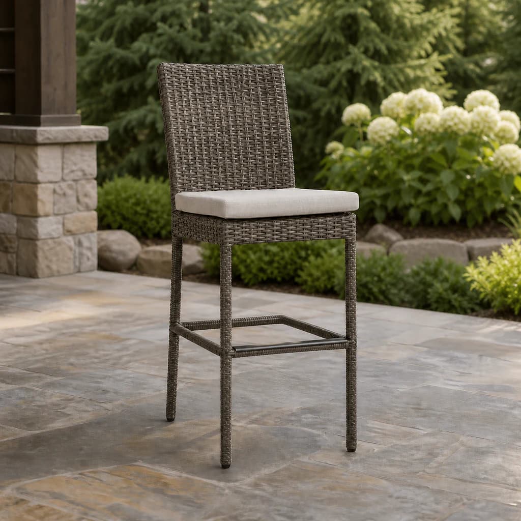 Ratana FN71241 Coral Gables bar chair with footrest on an evergreen patio.