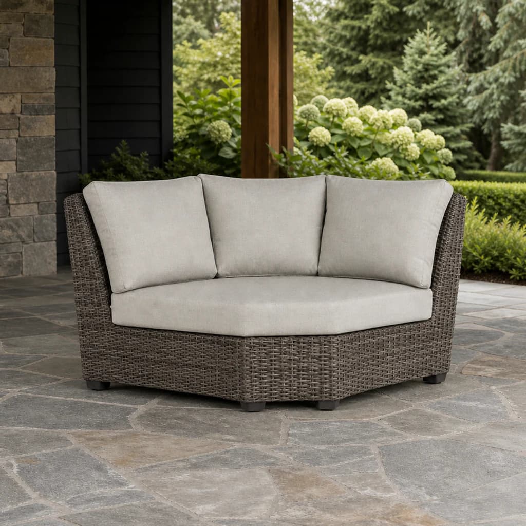 Ratana FN71253-V Coral Gables curved corner module on a covered evergreen patio.