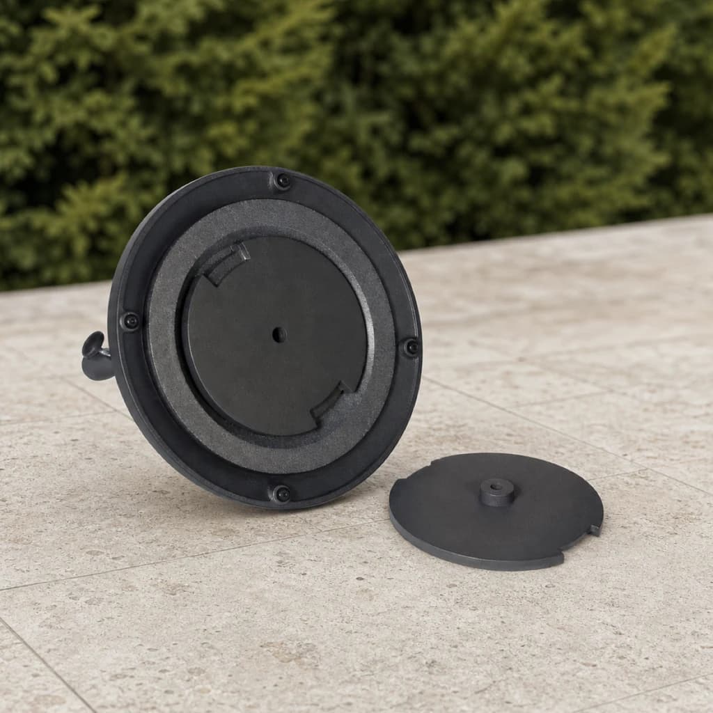 Ratana UM00606ADD-OND-OND-OND-OND-ON black cast-iron add-on base weight and insert on a Pacific Northwest patio.