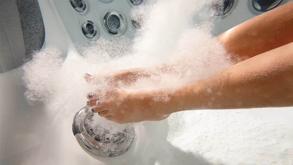 Hydromassage jets streaming in the recovery seating of a swim spa