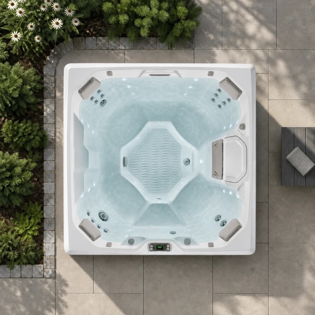 Hot Spring Beam hot tub overhead view filled with water in a premium summer backyard setting