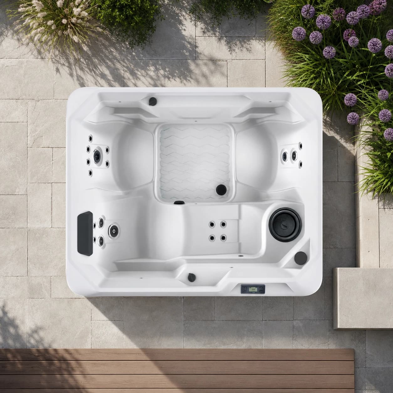 Hot Spring Stride hot tub overhead view in a premium summer backyard setting