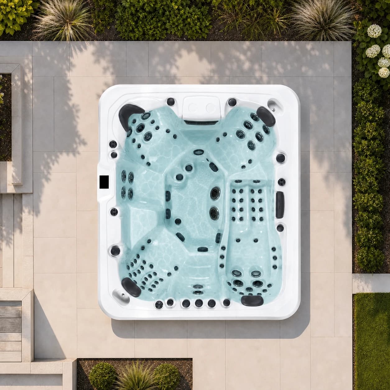 Platinum Spas Maximus filled with water in a premium outdoor setting