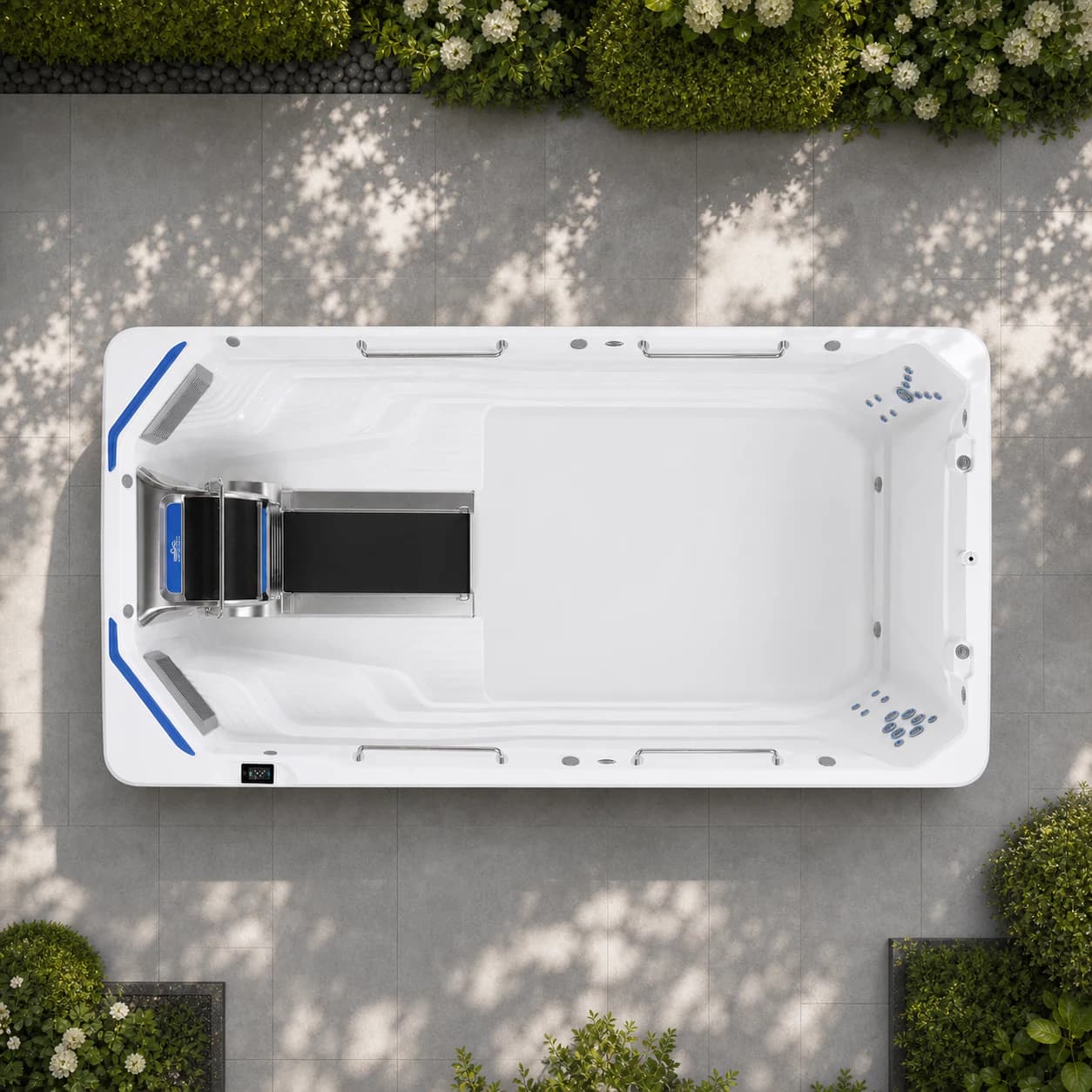 Endless Pools E550 swim spa overhead view in a premium summer backyard setting