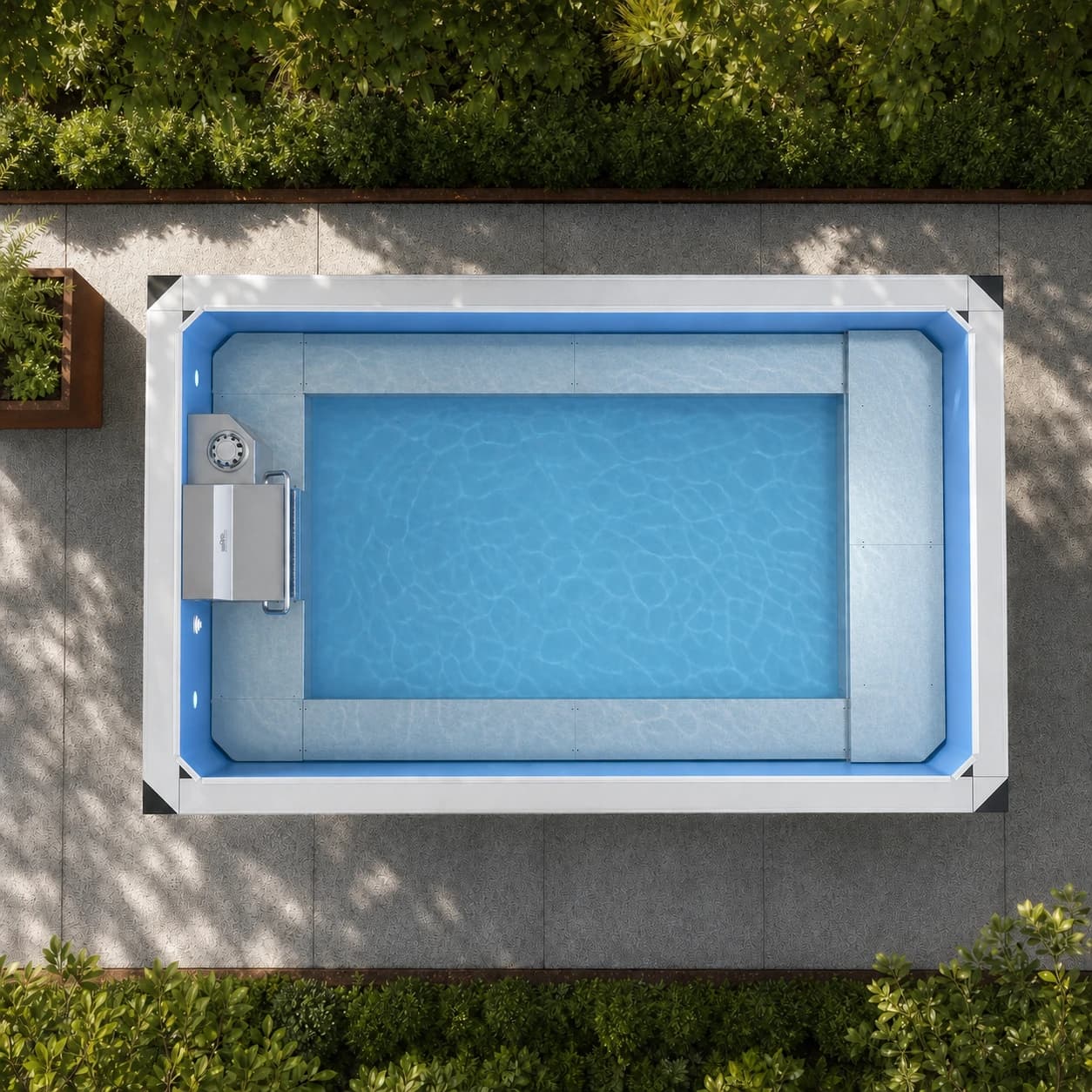 Endless Pools EP207 modular pool overhead view filled with water in a premium summer backyard setting