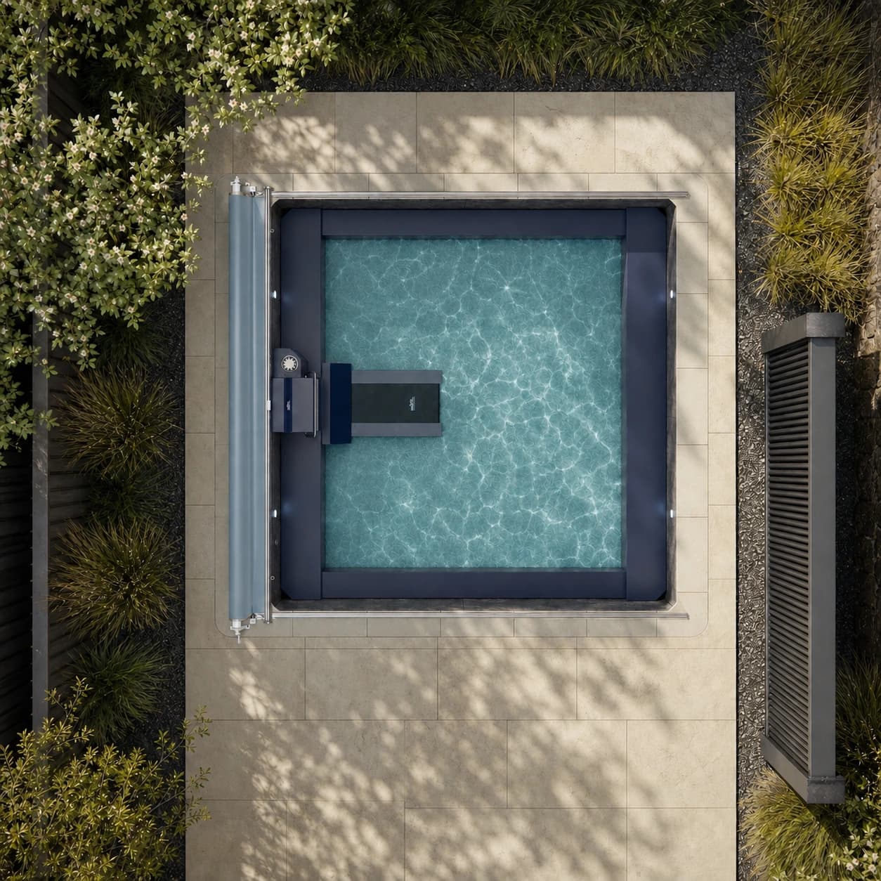 Endless Pools EP515 Plus modular pool overhead view filled with water in a premium summer backyard setting