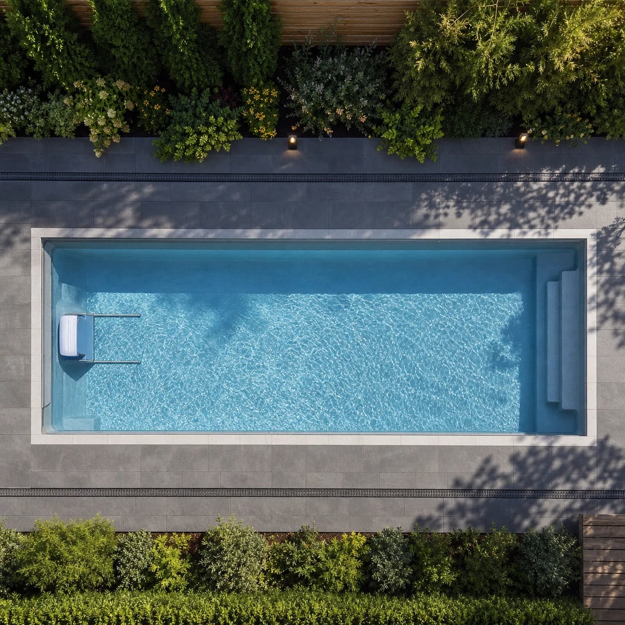 Endless Pools Fastlane Swim fitness system installed in a premium backyard pool
