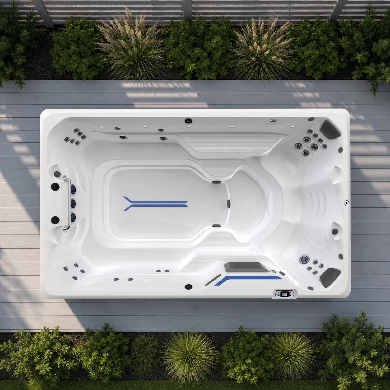 Endless Pools R220 swim spa overhead view in a premium summer backyard setting