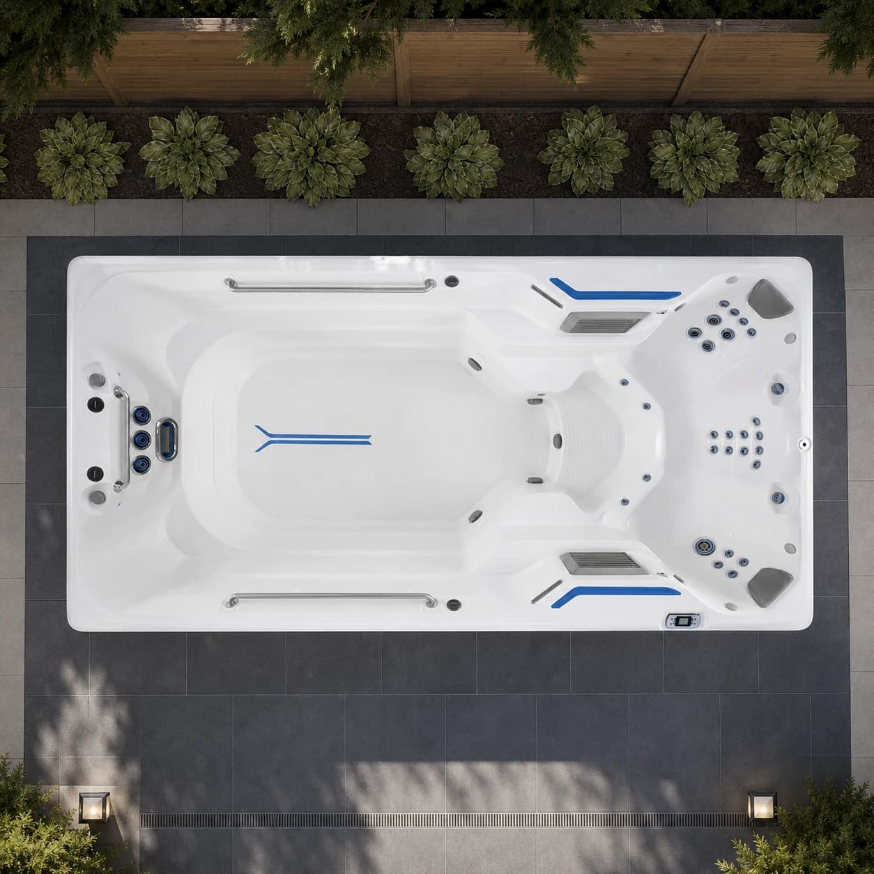 Endless Pools X500 swim spa overhead view in a premium summer backyard setting