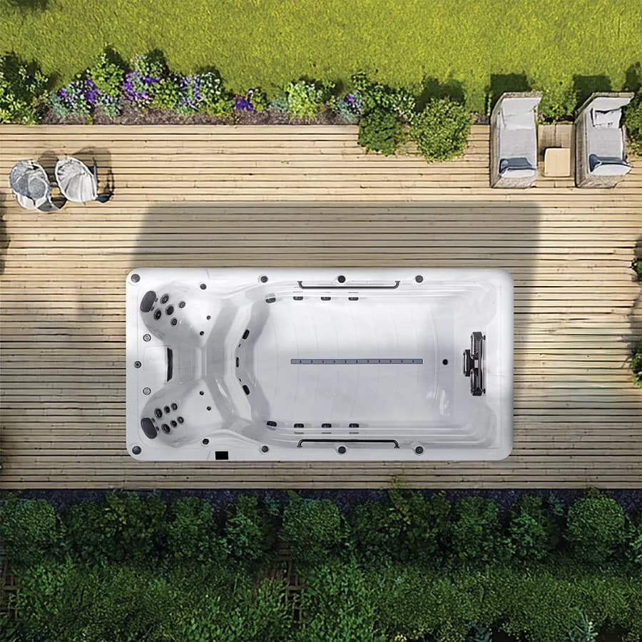 Platinum Spas Eros swim spa overhead view in a premium summer backyard setting