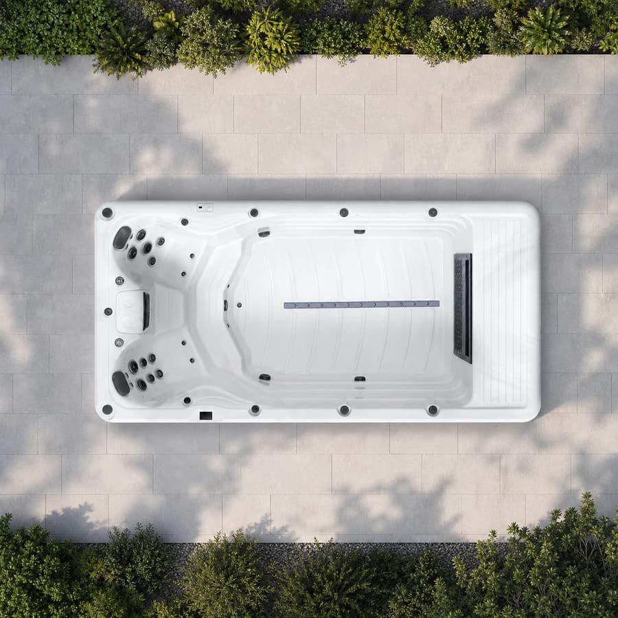 Platinum Spas Eros Pro swim spa overhead view in a premium summer backyard setting