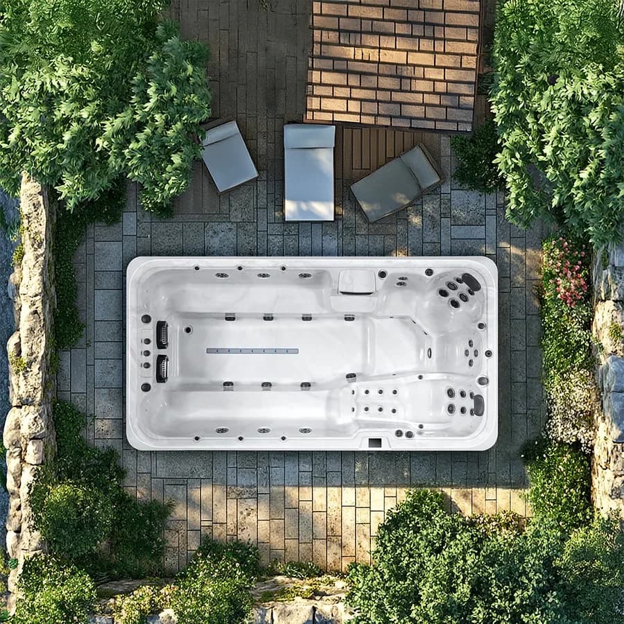 Platinum Spas Titan swim spa overhead view in a premium summer backyard setting