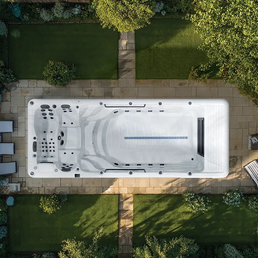 Platinum Spas Zelus Pro swim spa overhead view in a premium summer backyard setting